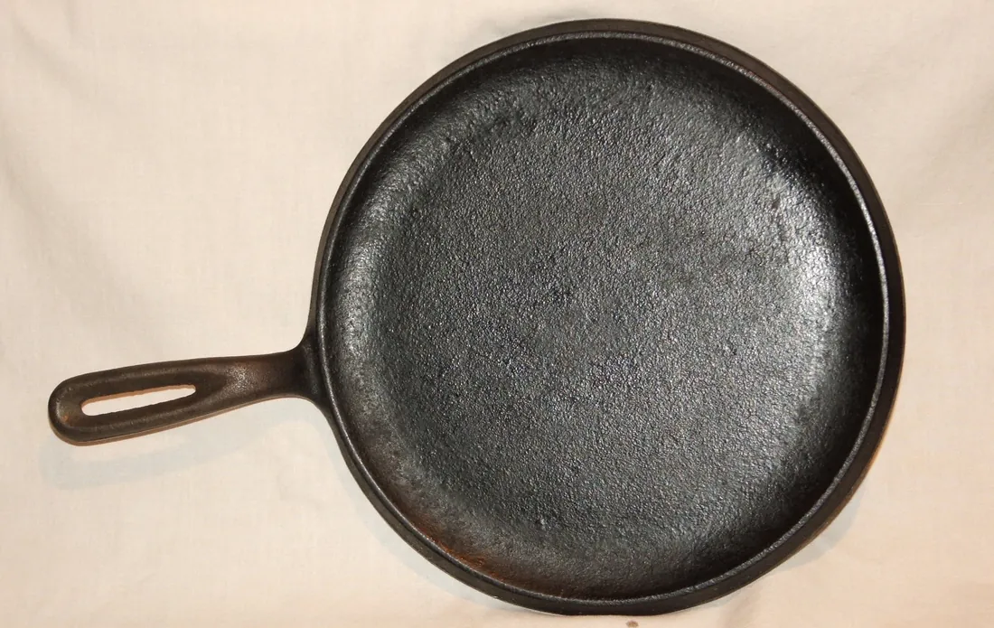 Photograph of a cast iron comal